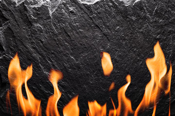Black slate with fire closeup. Can be used like food background