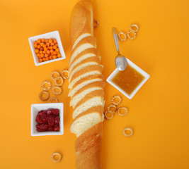 Top view on french bread jam cottage cheese and butter