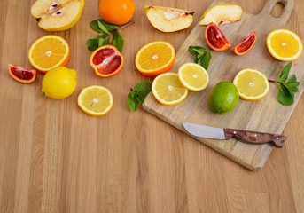 Mix citrus fresh fruit on the wooden table