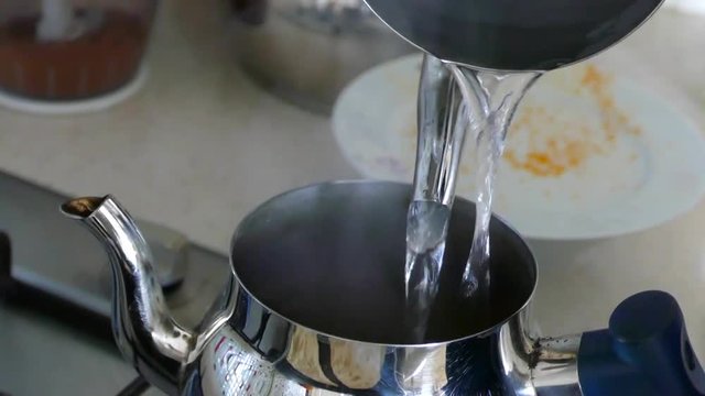 The Turkish method of making tea in the teapot,
