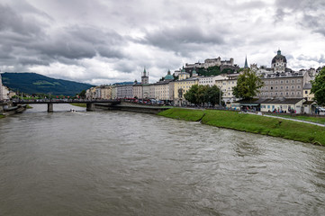 Fototapeta premium Panoramic view of the west bank of Salzburg with the fortress in the background, Austria