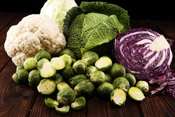 organic cabbage heads. Antioxidant balanced diet eating with red cabbage, white cabbage and savoy....