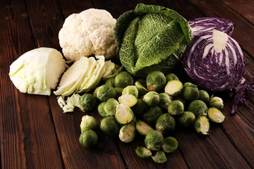 organic cabbage heads. Antioxidant balanced diet eating with red cabbage, white cabbage and savoy....