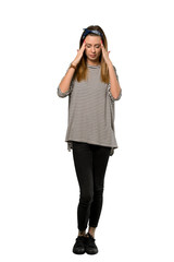 A full-length shot of a Young woman with headscarf with headache over isolated white background