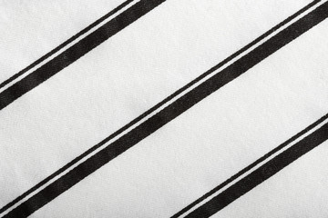 Fototapeta premium Black and white striped cotton fabric. The texture of cotton fabric.