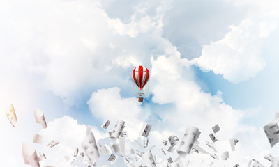 Flying hot air balloon in the air.