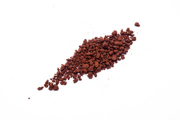 Coffee powder explosion with splash isolated on white background