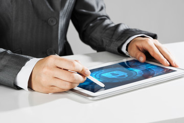 Internet security concept with woman working on media screen with stylus
