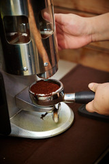 Making coffee with machine 