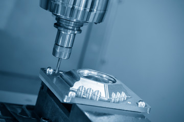 The  CNC milling machine cutting the mould part with the solid ball end mill tool.The hi-technology...