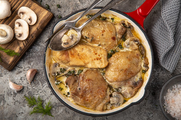 roasted  chicken with mushroom in cream garlic sause  on pan