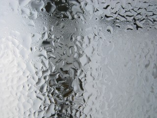 Large drops of water on the window