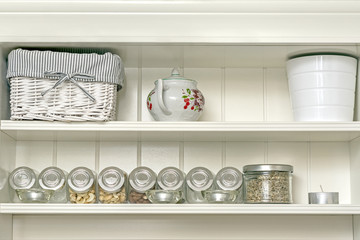 Kitchen shelf with jars.