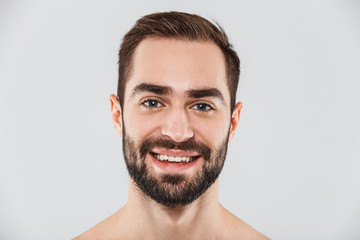 Obraz premium Close up of a young handsome bearded shirtless man