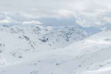 Fototapeta na wymiar Snow-white mountains of the Alps