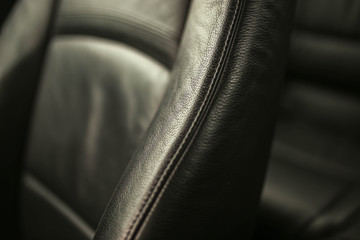 expensive leather upholstery of the car business interior.