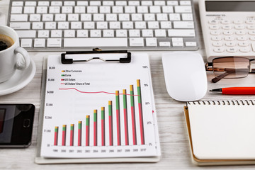 Items for business on a light background on the table, view from the top