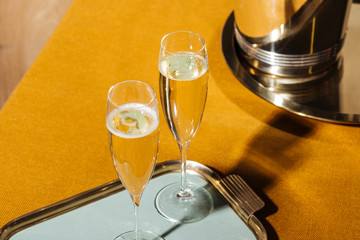 Valdobbiadene Cartizze Prosecco flutes and a bottle, in pop contemporary style. Prosecco is an...