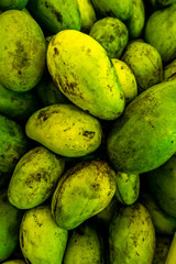 Fresh exotic tropical fruit green mano for sale on a local market, Bali island.