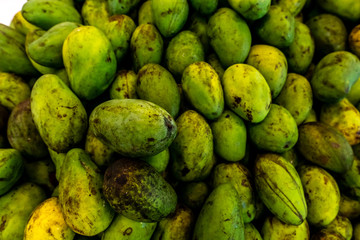 Fresh exotic tropical fruit green mano for sale on a local market, Bali island.