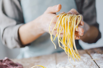 Chef making fresh italian pasta