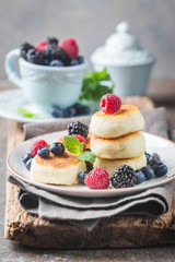 Cottage cheese pancakes with berries. Healthy Breakfast.
