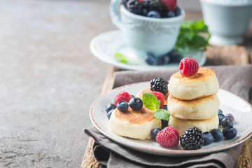 Cottage cheese pancakes with berries. Healthy Breakfast.