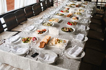 Salty dishes prepared for the event on a white table.