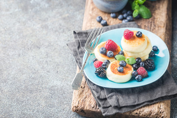 Cottage cheese pancakes with berries. Healthy Breakfast.