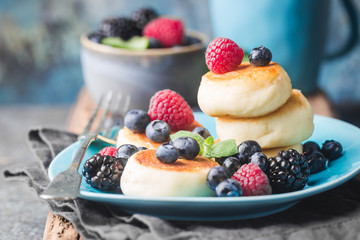 Cottage cheese pancakes with berries. Healthy Breakfast.