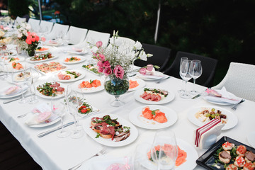 Salty dishes prepared for the event on a white table.