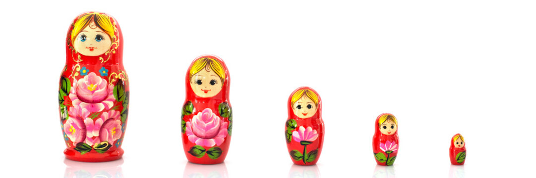 Set of five matryoshka russian nesting dolls isolated on panoramic white background