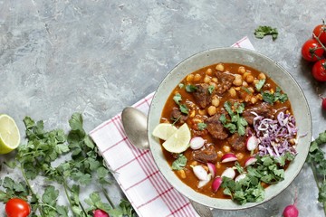 Beef Pozole. with beef and chickpeas. festive Mexican rich soup.