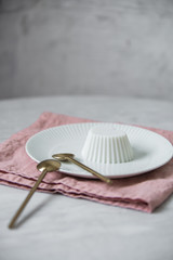 Vegan coconut Raspberry panna cotta decorated with ripe berry