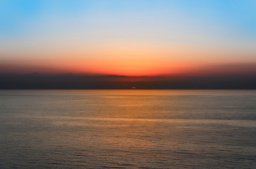 Beautiful colorful sunset above sea