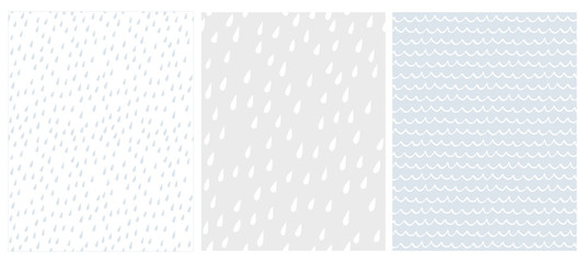 Set of 3 Cute Abstract Geometric Vector Patterns. White, Gray and Blue Color Design. Brushed Raindrops on a White and Light Grey. Irregular White Waves on a Light Blue Background. 