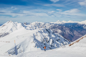 Fototapeta na wymiar skiers in the mountains