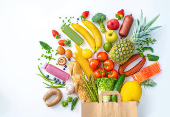 Shopping bag with groceries full of fresh vegetables and fruits