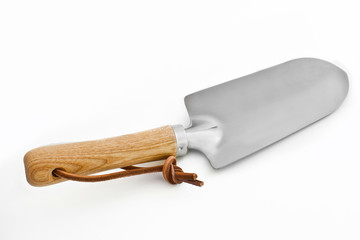 Garden shovel against white background