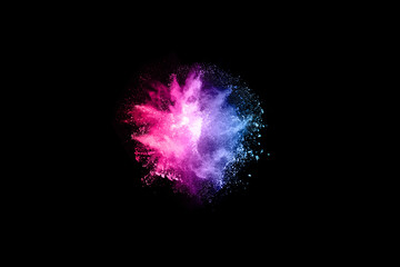 abstract colored dust explosion on a black background.abstract powder splatted background,Freeze motion of color powder exploding/throwing color powder, multicolored glitter texture.