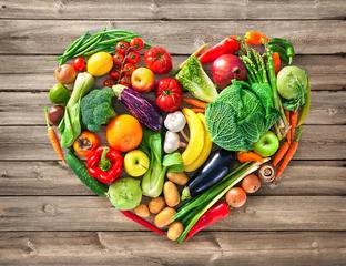 Gordijnen Heart shape by various vegetables and fruits © Alexander Raths