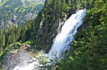 Fototapeta premium The Krimml Waterfalls (German: Krimmler Wasserfälle) are the highest waterfall in Austria. Water in Europe with spray in summer