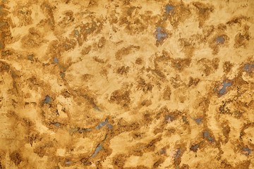 Shiny yellow leaf gold foil texture background