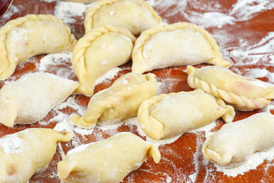 Uncooked traditional ukrainian cherry damplings