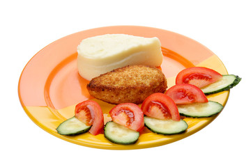 Fish cutlet with mashed potatoes and fresh vegetables. Meals for children.