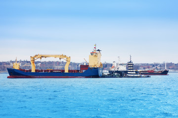 Cargo ships anchored at terminal of maritime port