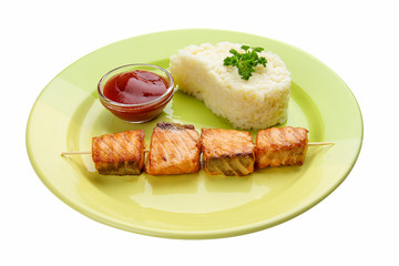 Kebab with salmon and rice. Meals for children.