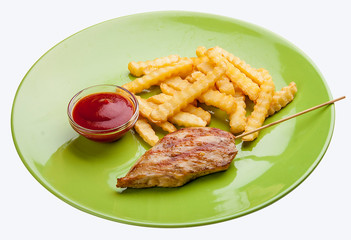 Grilled chicken fillet with French fries and sauce. Meals for children.
