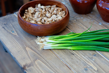 Scallion or bunch onion and mushrooms