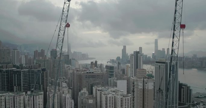 Drone aerial shot of modern skyscrapers in Hong Kong Island.